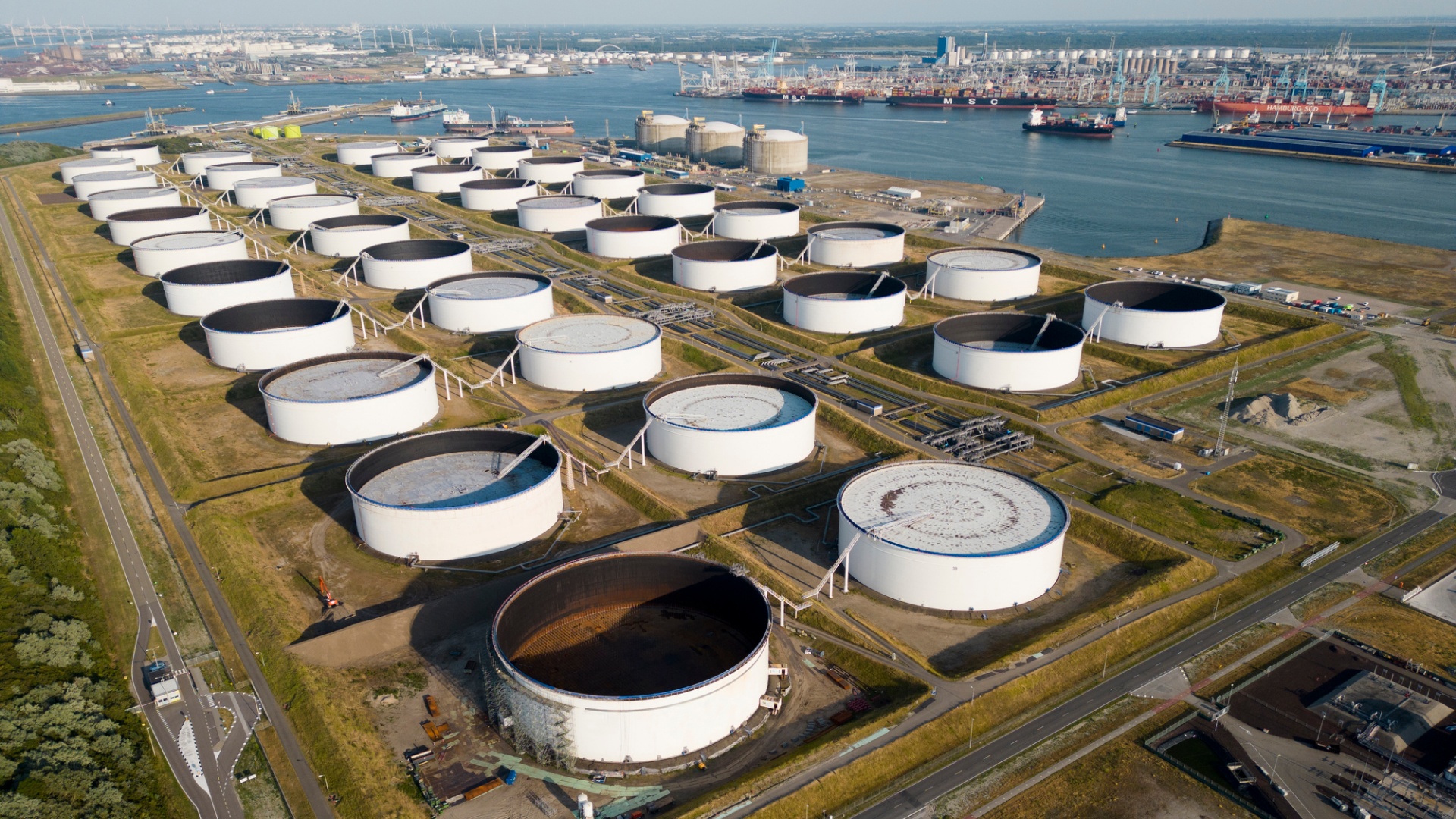 Oil storage tanks at an industrial port