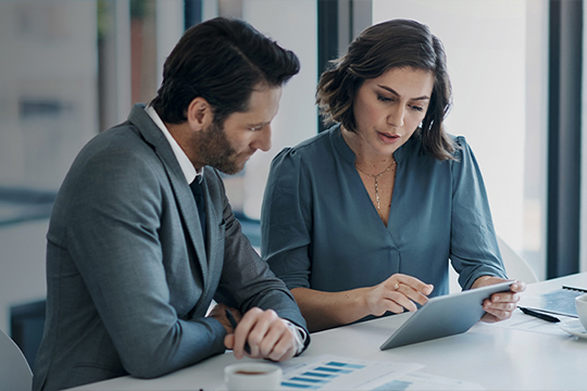 Man and woman walking mid-conversation